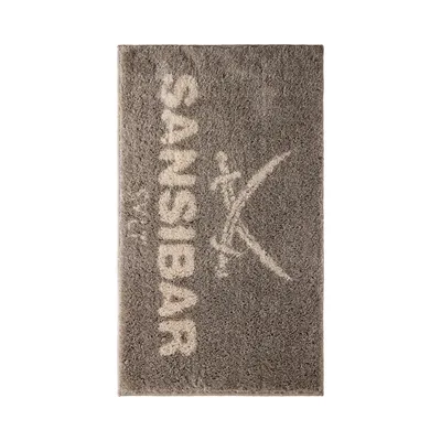 Produktbild von Sansibar Badematte mit Sansibar Logo Schriftzug, rutschhemmend beschichtet, Höhe 20 mm, taupe, 60x100 cm, fußbodenheizungsgeeignet, schnell trocknend