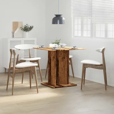 A dining table with chairs in a room.