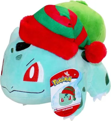 A plush toy of the Pokémon character Bulbasaur wearing a Christmas hat.