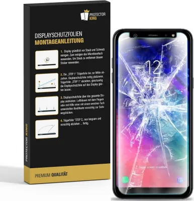 A product packaging box with instructions and a smartphone with a cracked screen.