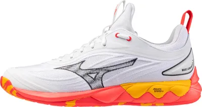 A side view of a white athletic shoe with red and yellow accents.