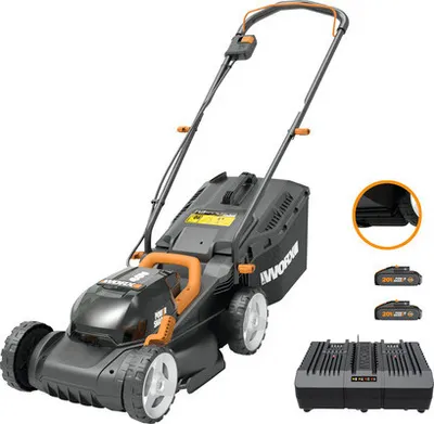 A black and orange electric lawnmower is shown with accessories including batteries and a charger.