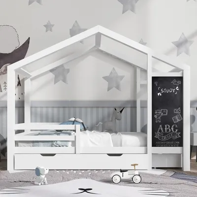 A child's bedroom with a white house-shaped bed.