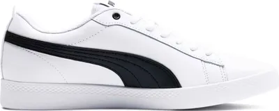 A side view of a white Puma sneaker with a black stripe.
