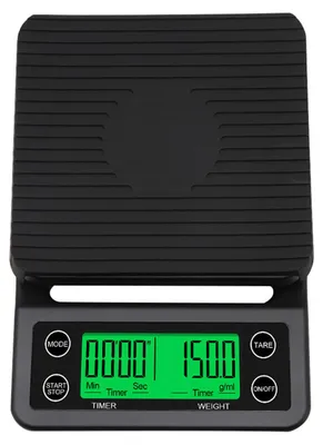 A black digital kitchen scale with a green display.
