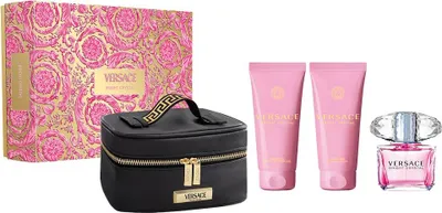 A Versace Bright Crystal Eau De Toilette gift set including a makeup bag, two lotions, and a perfume bottle, displayed on a white background.