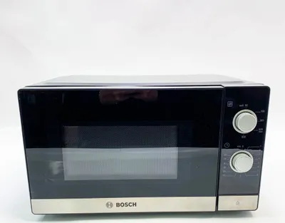 Zdjęcie produktu dla Kuchenka mikrofalowa Bosch FFL020MS2, 26 x 44 cm, 800 W, talerz obrotowy 27 cm, lewy zawias drzwi, wspornik do czyszczenia, oświetlenie LED zapewniające równomierne oświetlenie