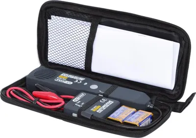 A kit for a DC short circuit detector is shown inside its black carrying case.