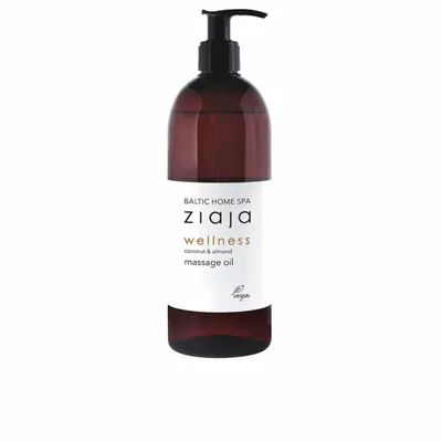A bottle of massage oil with a pump dispenser.