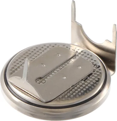 Close-up of a coin cell battery with mounting tabs.