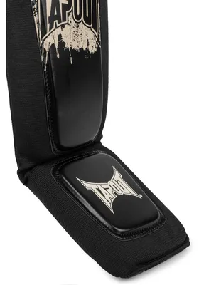 Produktbild von Schienbeinschoner (1 Paar) LENWOOD Black/Ecru S/M Tapout