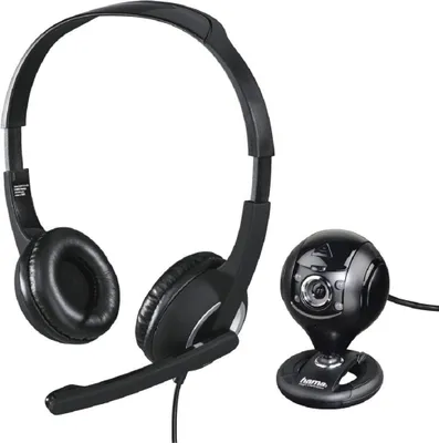 A black headset with a microphone and a black webcam are displayed on a white background.