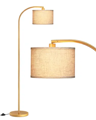 A gold arc floor lamp with two beige fabric lampshades against a white background.