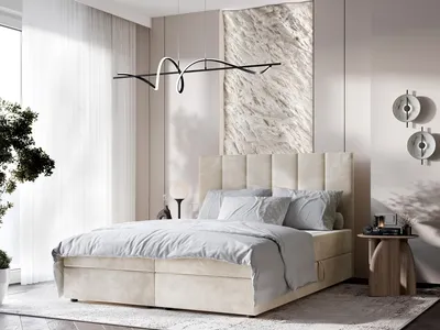 A bedroom scene with a large bed as the focal point.