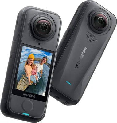 Two Insta360 X4 Air cameras are shown against a white background. One camera is in the foreground, displaying a family on its screen. The second camera is positioned behind and to the right of the first.