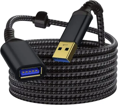 A coiled black and gray USB extension cable with gold and blue USB connectors.