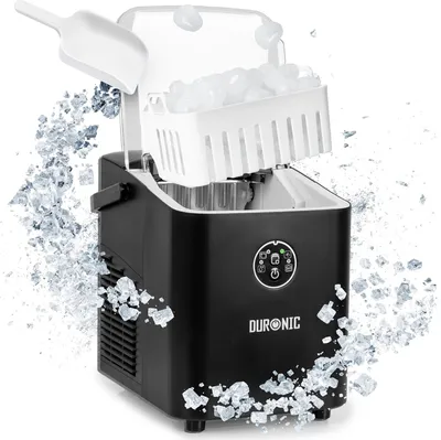 A black ice maker with ice cubes spilling out around it, and a scoop holding ice cubes.