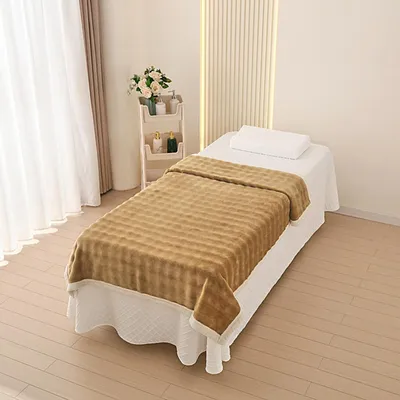 Immagine prodotto di Coperta in velluto per lettino da massaggio, ideale per spa e centri estetici