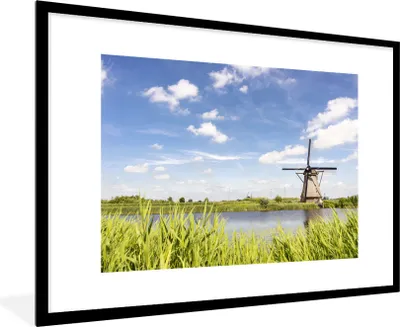 Produktbild von MuchoWow® Gerahmtes Poster Holländische Windmühle in Kinderdijk 90x60 cm - Poster mit Schwarzem Bilderrahmen Wandposter Rahmen Foto Bilder - Wanddekoration - Fotos