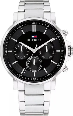 A close-up studio shot of a Tommy Hilfiger analog watch.