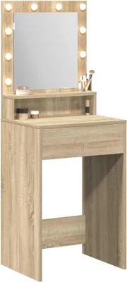 A vanity table with a mirror and lights.