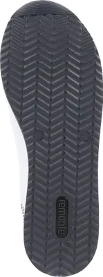 The image shows the sole of a shoe against a white background.