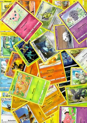 Produktbild von 50 Pokemon Karten - keine doppelt - Deutsch inkl. + Emiro Toploader