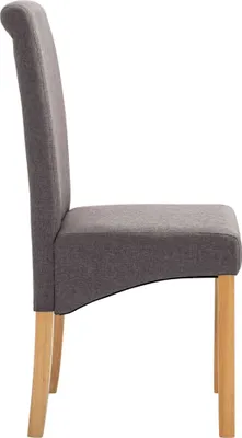 A side view of a single gray upholstered dining chair with wooden legs, isolated on a white background.