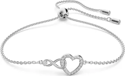 A silver bracelet with a heart and infinity symbol charm, set against a white background.