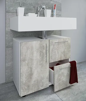 A modern bathroom vanity with a sink and cabinet.