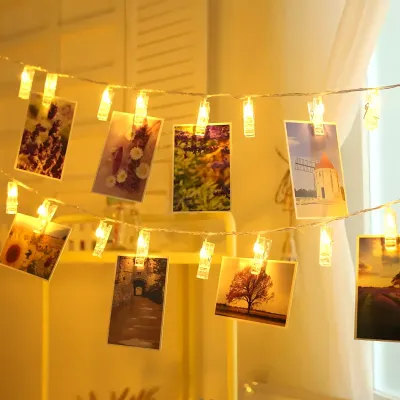 LED-Fotolichterkette 3m, 20 Clips, Timer, warmweiß, batteriebetrieben