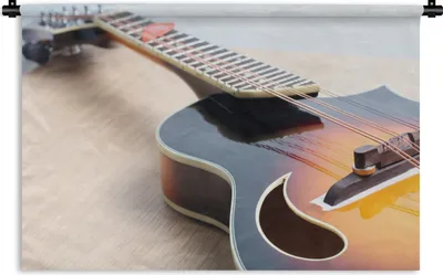 Produktbild von MuchoWow® Wandteppich Wandbehang Eine E-Gitarre auf einem Holzboden 90x60 cm Tapisserie Dekoration Wandtuch - Wandskulpturen - Bildteppich