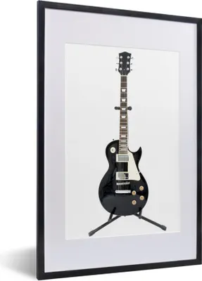 Produktbild von MuchoWow® Gerahmtes Poster Eine schwarze E-Gitarre 40x60 cm - Poster mit Schwarzem Bilderrahmen Wandposter Rahmen Foto Bilder - Poster in Rahmen