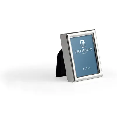 A silver photo frame with a blue insert displaying the Zilverstad logo and dimensions.