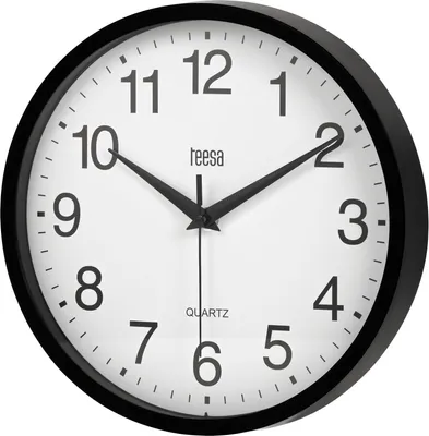 A black and white analog wall clock with a black frame and a white face, displaying numbers and hands.