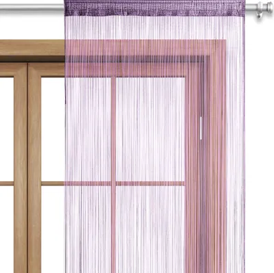 A string curtain hanging in front of a wooden window frame.
