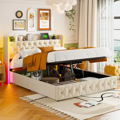 A bedroom scene featuring a beige upholstered bed with storage.