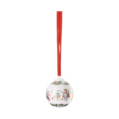 A single Christmas ornament hanging from a red ribbon against a white background.