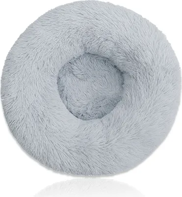 A fluffy, round pet bed with a raised edge, shown from a top-down perspective on a white background.