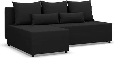 A black sectional sofa with pillows.
