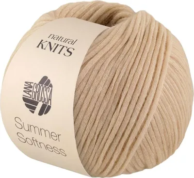 A ball of beige yarn with a label.