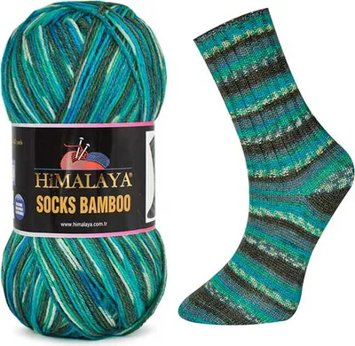 A ball of yarn and a knitted sock made from the yarn.