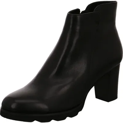 A black ankle boot is shown against a white background.