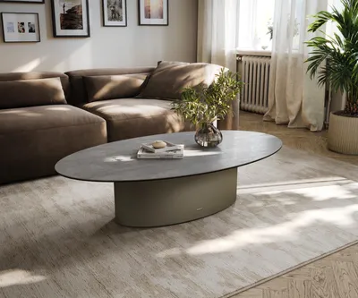 Produktbild von DELIFE Couchtisch Edge Oval 140x80 cm Keramik Beton Grau Casilda Effektfinish Titan