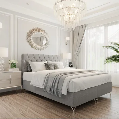 A luxurious bedroom with a large bed, elegant decor, and soft lighting.