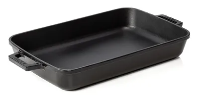 A black cast iron roasting pan is shown on a white background.