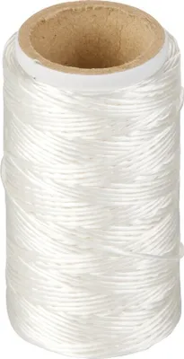 A spool of white kitchen twine on a cardboard tube.