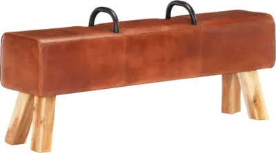 A vintage-style pommel horse bench with leather upholstery and wooden legs, shown against a white background.