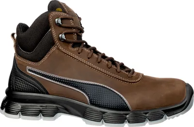 A single brown Puma safety boot is shown against a white background.