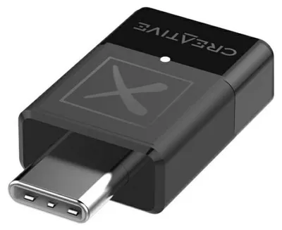 A black Creative Labs Bluetooth audio transmitter with a USB-C connector.